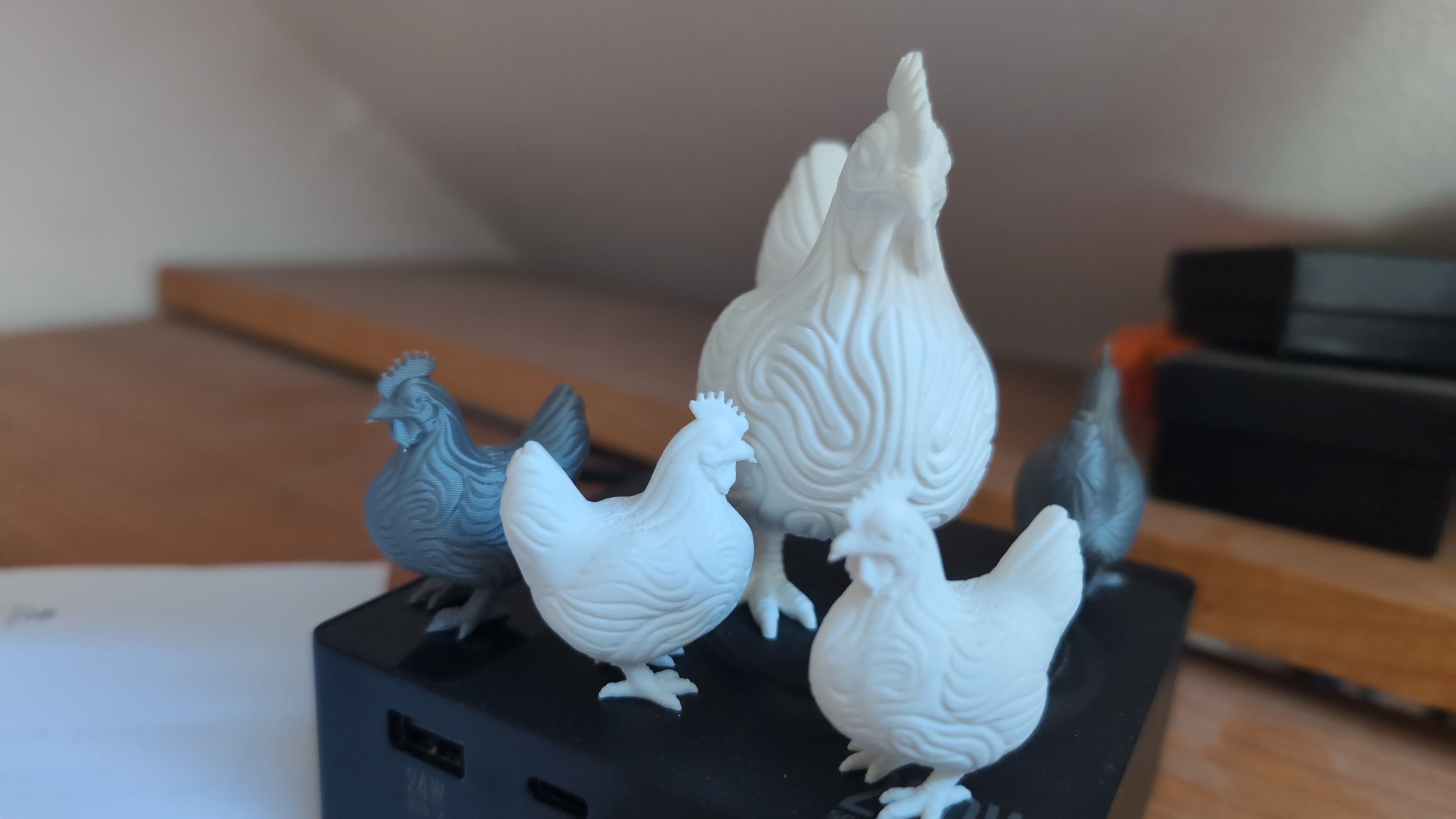 Four 3D-printed chicken